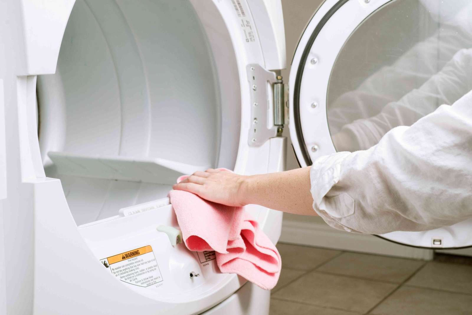Cleaning the inside of a clothes dryer drum