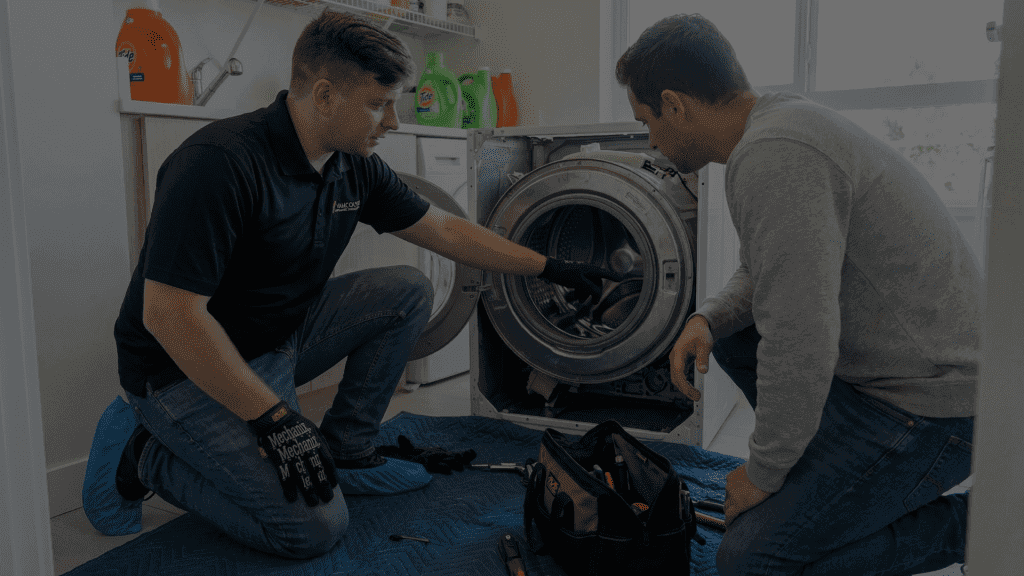 Vancouver appliance service pros technician Nick showing the customer what the problem is with their washing machine in Kitsilano BC.