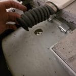Maytag front-load washing machine tub hose replacement in Burnaby, BC.